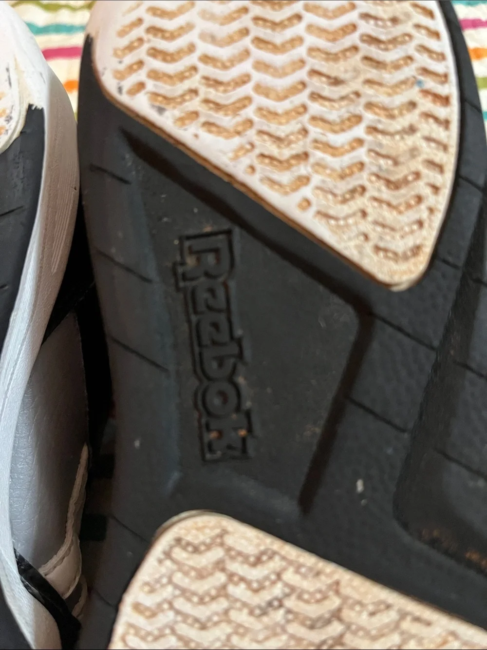 Gray and black Reebok youth size 5